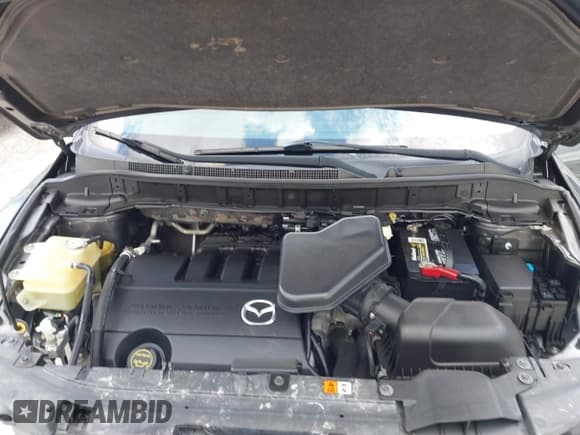 ✅ 2014 Mazda CX-9 Grand Touring • VIN: JM3TB2DA2E0433985 • Lot: 43062902. Wystawiony na IAAI z przebiegiem 127 332 mil. Bezpłatny archiwum sprzedaży aukcyjnych z USA i szczegółowy raport historii pojazdu na DreamBid. Zdjęcie 10.