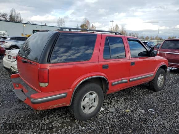 1999 Chevrolet Blazer LS z VIN 1GNDT13WXXK201988, wystawiony jako Copart lot #81960364 z przebiegiem 219 613 mil mil oraz Szkoda całkowita • Salvage title. Historia ofert i sprzedaży dostępna na DreamBid. Obrazek 3.