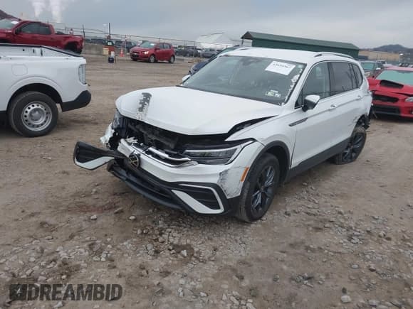 ✅ 2023 Volkswagen Tiguan SE • VIN: 3VV2B7AX0PM019809 • Лот: 43694567. Опубликован ранее на IAAI с пробегом 21 500 миль. Бесплатный доступ к архиву аукционных продаж из США и подробный отчёт об истории автомобиля на DreamBid. Изображение 2.