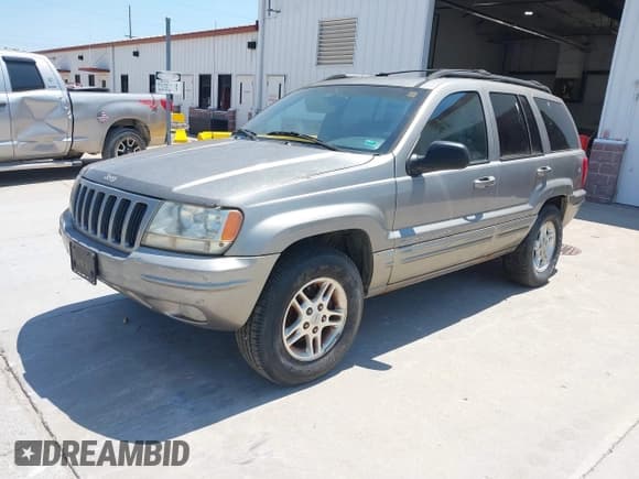 ✅ 1999 Jeep Grand Cherokee Limited • VIN: 1J4GW68S2XC675499 • Лот: 42887084. Опубликован ранее на IAAI с пробегом 167 420 миль. Бесплатный доступ к архиву аукционных продаж из США и подробный отчёт об истории автомобиля на DreamBid. Изображение 2.