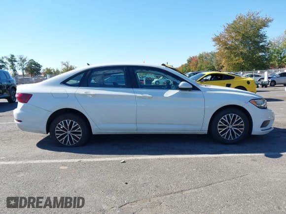 ✅ 2021 Volkswagen Jetta S • VIN: 3VWC57BU6MM015156 • Lot: 43407215. Listed on IAAI with 130,320 mi. Free auction sales archive from the USA and detailed vehicle history report at DreamBid. Image 13.