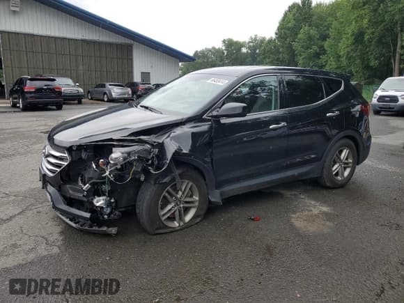 ✅ 2018 Hyundai Santa Fe 2.4L • VIN: 5XYZTDLB9JG569962 • Лот: 66455414. Опубликован ранее на Copart с пробегом 100 231 миль. Бесплатный доступ к архиву аукционных продаж из США и подробный отчёт об истории автомобиля на DreamBid. Изображение 1.