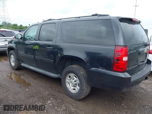 ✅ 2011 Chevrolet Suburban • VIN: 1GNWKMEG1BR374950 • Lot: 42781182. Listed on IAAI with 304,690 mi. Free auction sales archive from the USA and detailed vehicle history report at DreamBid. Image 3.