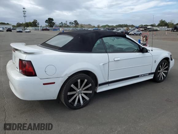 ✅ 2002 Ford Mustang Deluxe • VIN: 1FAFP44402F206080 • Лот: 69954824. Опубликован ранее на Copart с пробегом Не указан. Бесплатный доступ к архиву аукционных продаж из США и подробный отчёт об истории автомобиля на DreamBid. Изображение 3.