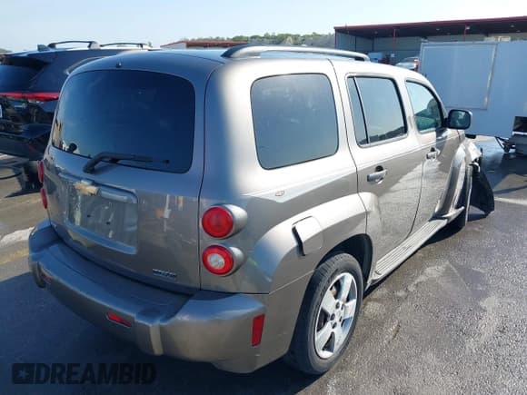 ✅ 2011 Chevrolet HHR LS • VIN: 3GNBAAFW9BS607895 • Lot: 42029086. Listed on IAAI with 98,149 mi. Free auction sales archive from the USA and detailed vehicle history report at DreamBid. Image 4.