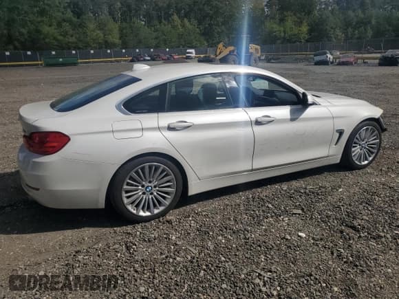 ✅ 2015 BMW 4 Series 435i xDrive • VIN: WBA4B3C58FGV48121 • Lot: 85146585. Listed on Copart with 76,930 mi. Free auction sales archive from the USA and detailed vehicle history report at DreamBid. Image 3.