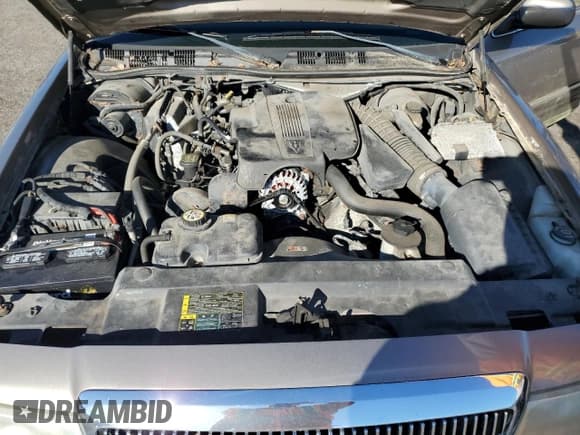 ✅ 2005 Mercury Grand Marquis GS • VIN: 2MEFM74W85X608085 • Лот: 82492755. Опубликован ранее на Copart с пробегом 138 107 миль. Бесплатный доступ к архиву аукционных продаж из США и подробный отчёт об истории автомобиля на DreamBid. Изображение 11.