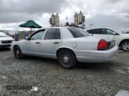 ✅ 2003 Ford Police Interceptor Street Appear • VIN: 2FAFP71W63X203813 • Lot: 48082565. Listed on Copart with 65,242 mi. Free auction sales archive from the USA and detailed vehicle history report at DreamBid. Image 2.