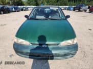 ✅ 2000 Chevrolet Prizm • VIN: 1Y1SK5284YZ411021 • Lot: 66666935. Listed on Copart with 137,188 mi. Free auction sales archive from the USA and detailed vehicle history report at DreamBid. Image 5.