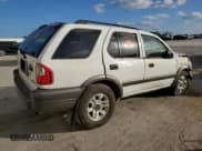 ✅ 2004 Isuzu Rodeo S • VIN: 4S2CK58Y244309017 • Lot: 83303294. Listed on Copart with 121,723 mi. Free auction sales archive from the USA and detailed vehicle history report at DreamBid. Image 3.