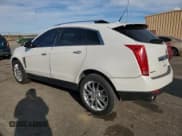 ✅ 2014 Cadillac SRX Premium Collection • VIN: 3GYFNGE32ES658467 • Лот: 82778375. Опубликован ранее на Copart с пробегом 108 159 миль. Бесплатный доступ к архиву аукционных продаж из США и подробный отчёт об истории автомобиля на DreamBid. Изображение 2.