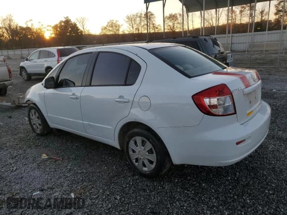 ✅ 2010 Suzuki SX4 LE • VIN: JS2YC5A24A6301771 • Lot: 83049774. Wystawiony na Copart z przebiegiem 165 033 mil. Bezpłatny archiwum sprzedaży aukcyjnych z USA i szczegółowy raport historii pojazdu na DreamBid. Zdjęcie 2.