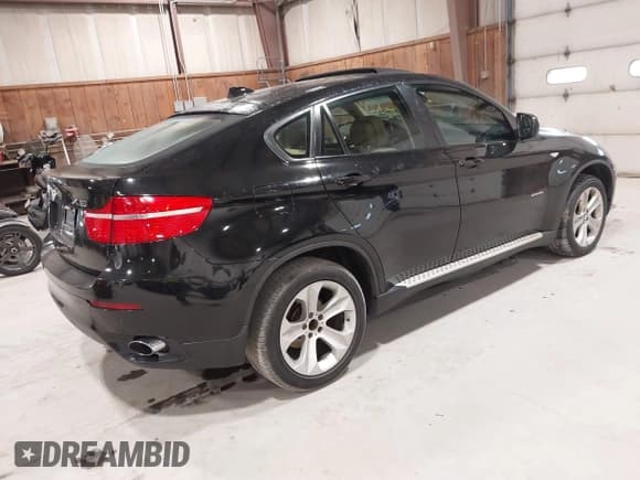 ✅ 2011 BMW X6 35i • VIN: 5UXFG2C56BLX09086 • Lot: 43459630. Listed on IAAI with 163,438 mi. Free auction sales archive from the USA and detailed vehicle history report at DreamBid. Image 4.