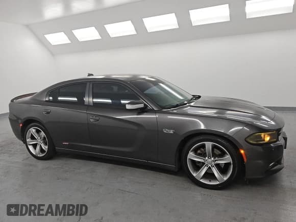 ✅ 2015 Dodge Charger RT • VIN: 2C3CDXCT0FH817168 • Lot: 91712535. Listed on Copart with 100,169 mi. Free auction sales archive from the USA and detailed vehicle history report at DreamBid. Image 4.