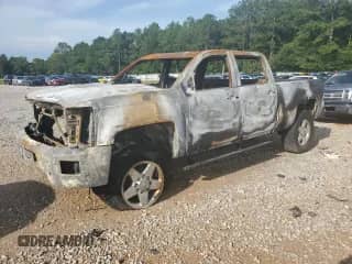 2015 Chevrolet Silverado 2500HD High Country с VIN 1GC1KXE86FF540674, выставлен на аукционе Copart как лот 62467165 с пробегом Не указан миль и Списание • Salvage title. История ставок и продаж доступна на DreamBid. Изображение 1.