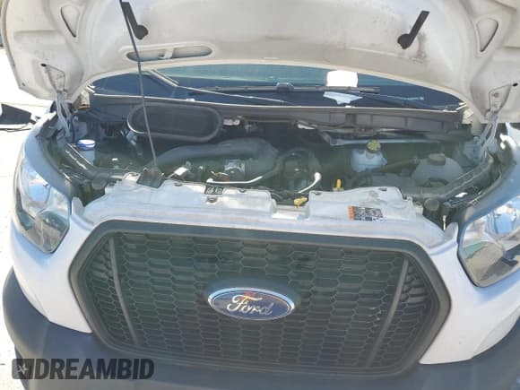 ✅ 2023 Ford Transit Cargo • VIN: 1FTBR1C84PKA12141 • Lot: 84907145. Wystawiony na Copart z przebiegiem 172 969 mil. Bezpłatny archiwum sprzedaży aukcyjnych z USA i szczegółowy raport historii pojazdu na DreamBid. Zdjęcie 11.