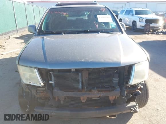 ✅ 2006 Nissan Pathfinder SE Off Road • VIN: 5N1AR18W26C656129 • Lot: 43769788. Wystawiony na IAAI z przebiegiem 198 959 mil. Bezpłatny archiwum sprzedaży aukcyjnych z USA i szczegółowy raport historii pojazdu na DreamBid. Zdjęcie 12.