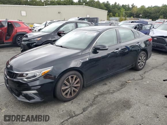 ✅ 2019 Kia Optima EX • VIN: 5XXGU4L11KG315938 • Лот: 81035045. Опубликован ранее на Copart с пробегом 86 522 миль. Бесплатный доступ к архиву аукционных продаж из США и подробный отчёт об истории автомобиля на DreamBid. Изображение 1.