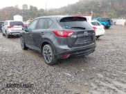 ✅ 2016 Mazda CX-5 Grand Touring • VIN: JM3KE4DY7G0716767 • Lot: 43573068. Wystawiony na IAAI z przebiegiem 231 937 mil. Bezpłatny archiwum sprzedaży aukcyjnych z USA i szczegółowy raport historii pojazdu na DreamBid. Zdjęcie 3.