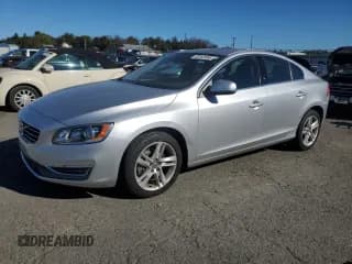 ✅ 2015 Volvo S60 T5 Premier • VIN: YV1612TKXF1358753 • Lot: 82441685. Listed on Copart with 79,261 mi. Free auction sales archive from the USA and detailed vehicle history report at DreamBid. Image 1.