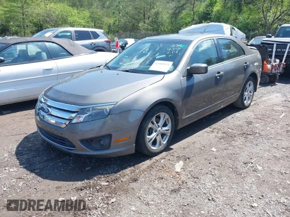 ✅ 2012 Ford Fusion SE • VIN: 3FAHP0HA5CR253997 • Lot: 41989525. Wystawiony na IAAI z przebiegiem 153 643 mil. Bezpłatny archiwum sprzedaży aukcyjnych z USA i szczegółowy raport historii pojazdu na DreamBid. Zdjęcie 2.