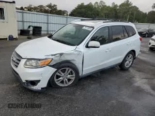 ✅ 2012 Hyundai Santa Fe SE • VIN: 5XYZH4AG2CG097607 • Lot: 79174504. Listed on Copart with 120,830 mi. Free auction sales archive from the USA and detailed vehicle history report at DreamBid. Image 1.