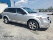 ✅ 2013 Dodge Journey SE • VIN: 3C4PDCAB2DT656231 • Lot: 63900535. Listed on Copart with 182,243 mi. Free auction sales archive from the USA and detailed vehicle history report at DreamBid. Image 4.