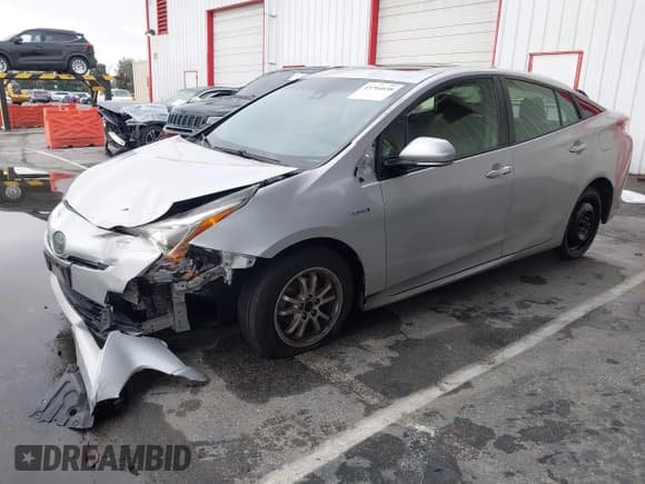 ✅ 2016 Toyota Prius Four • VIN: JTDKARFU4G3519274 • Lot: 43704038. Listed on IAAI with 131,497 mi. Free auction sales archive from the USA and detailed vehicle history report at DreamBid. Image 2.