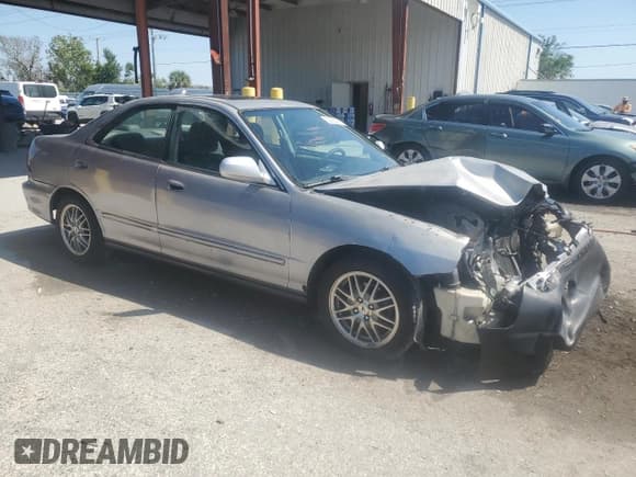 ✅ 1999 Acura Integra LS • VIN: JH4DB7653XS004192 • Lot: 52585435. Listed on Copart with 130,888 mi. Free auction sales archive from the USA and detailed vehicle history report at DreamBid. Image 4.
