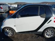 ✅ 2009 Smart fortwo Pure • VIN: WMEEJ31X99K292492 • Lot: 41029051. Listed on IAAI with 57,741 mi. Free auction sales archive from the USA and detailed vehicle history report at DreamBid. Image 14.