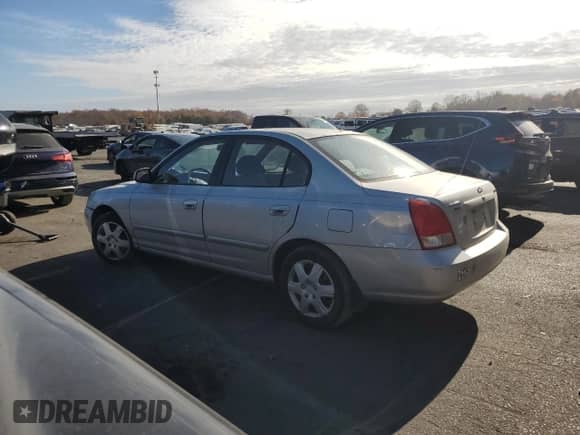 2001 Hyundai Elantra GLS z VIN KMHDN45D71U057338, wystawiony jako Copart lot #79084024 z przebiegiem 137 887 mil mil oraz Szkoda całkowita • Salvage title. Historia ofert i sprzedaży dostępna na DreamBid. Obrazek 2.