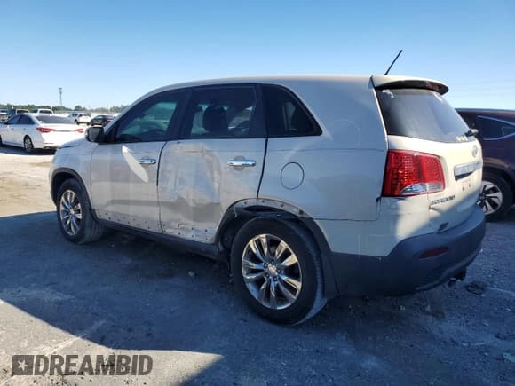 ✅ 2011 Kia Sorento EX • VIN: 5XYKU3A14BG021310 • Lot: 90604525. Listed on Copart with 221,607 mi. Free auction sales archive from the USA and detailed vehicle history report at DreamBid. Image 2.