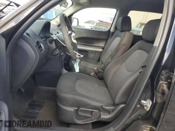 2010 Chevrolet HHR LS z VIN 3GNBAADB5AS582251, wystawiony jako Copart lot #87424905 z przebiegiem 154 154 mil mil oraz Szkoda całkowita • Salvage title. Historia ofert i sprzedaży dostępna na DreamBid. Obrazek 7.