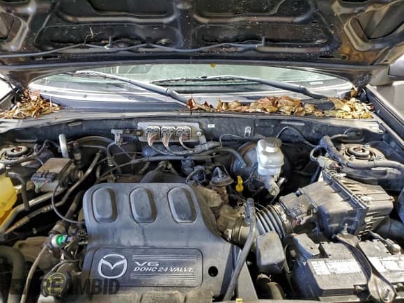 ✅ 2006 Mazda Tribute S • VIN: 4F2CZ96136KM29153 • Lot: 94643295. Listed on Copart with 41,381 mi. Free auction sales archive from the USA and detailed vehicle history report at DreamBid. Image 12.