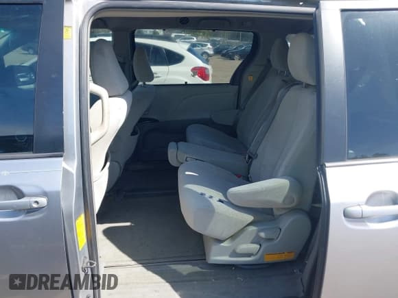 ✅ 2012 Toyota Sienna LE • VIN: 5TDKK3DC7CS247137 • Lot: 42064875. Listed on IAAI with 230,697 mi. Free auction sales archive from the USA and detailed vehicle history report at DreamBid. Image 8.