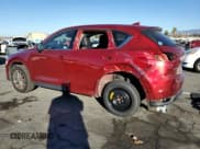 ✅ 2021 Mazda CX-5 Grand Touring • VIN: JM3KFADM9M0403935 • Лот: 90327955. Опубликован ранее на Copart с пробегом 56 664 миль. Бесплатный доступ к архиву аукционных продаж из США и подробный отчёт об истории автомобиля на DreamBid. Изображение 2.