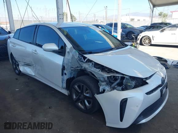 2021 Toyota Prius L Eco with VIN JTDKAMFU4M3134943, listed as a IAAI auction lot 43175713 with 106,611 mi miles and . Bid and sale history available at DreamBid. Image 6.