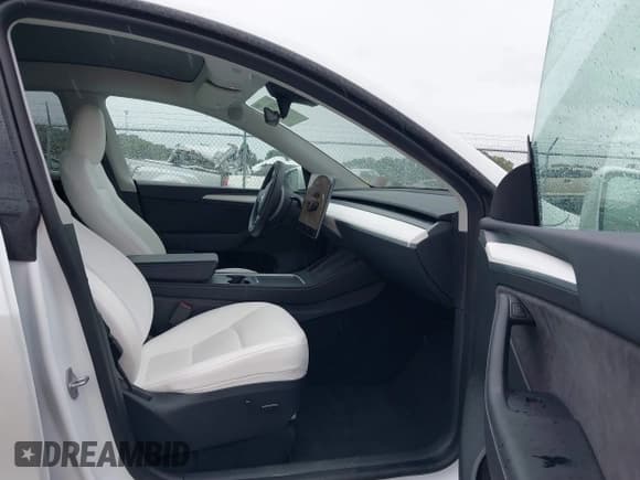 ✅ 2023 Tesla Model Y Long Range • VIN: 7SAYGDEE5PF712612 • Lot: 40392709. Listed on IAAI with 31,009 mi. Free auction sales archive from the USA and detailed vehicle history report at DreamBid. Image 5.