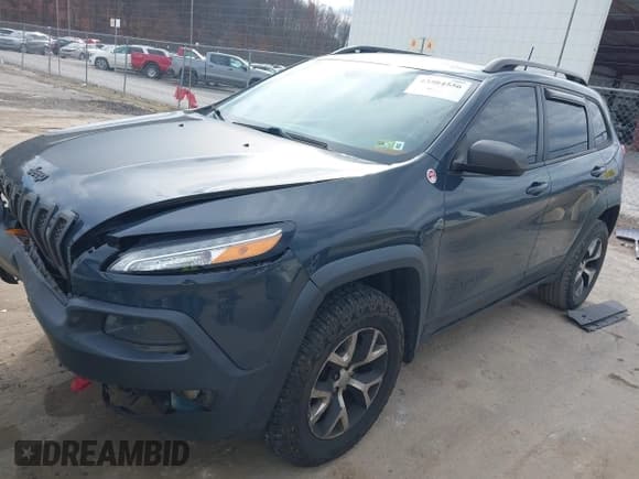 ✅ 2016 Jeep Cherokee Trailhawk • VIN: 1C4PJMBS7GW183731 • Lot: 43584556. Listed on IAAI with 123,183 mi. Free auction sales archive from the USA and detailed vehicle history report at DreamBid. Image 2.