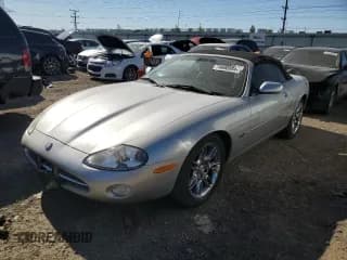 ✅ 2001 Jaguar XK • VIN: SAJDA42C01NA14650 • Лот: 74690984. Опубликован ранее на Copart с пробегом 55 189 миль. Бесплатный доступ к архиву аукционных продаж из США и подробный отчёт об истории автомобиля на DreamBid. Изображение 1.
