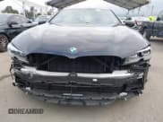 ✅ 2024 BMW 8 Series M850i • VIN: WBAGV8C02RCR25432 • Lot: 42068364. Listed on IAAI with 13,765 mi. Free auction sales archive from the USA and detailed vehicle history report at DreamBid. Image 6.