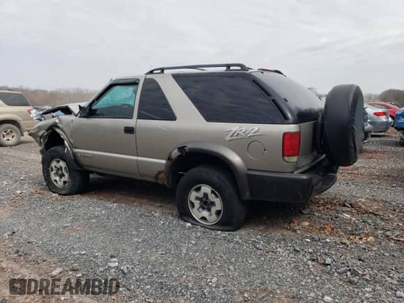 2004 Chevrolet Blazer LS с VIN 1GNCT18X34K143280, выставлен на аукционе Copart как лот 50494785 с пробегом Не указан миль и Списание • Salvage title. История ставок и продаж доступна на DreamBid. Изображение 2.