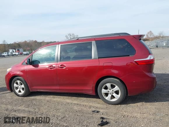 ✅ 2015 Toyota Sienna LE • VIN: 5TDKK3DCXFS609093 • Lot: 43643031. Listed on IAAI with 252,964 mi. Free auction sales archive from the USA and detailed vehicle history report at DreamBid. Image 14.