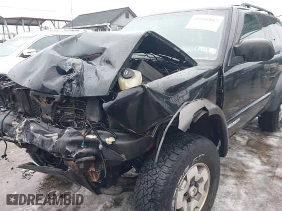 2004 Chevrolet Blazer LS with VIN 1GNCT18X84K107391, listed as a IAAI auction lot 41366867 with 188,821 mi miles and . Bid and sale history available at DreamBid. Image 18.