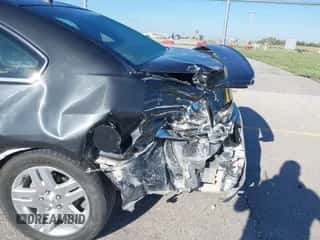 2013 Chevrolet Impala LT z VIN 2G1WG5E33D1130718, wystawiony jako IAAI lot #43299949 z przebiegiem 152 149 mil mil oraz . Historia ofert i sprzedaży dostępna na DreamBid. Obrazek 6.