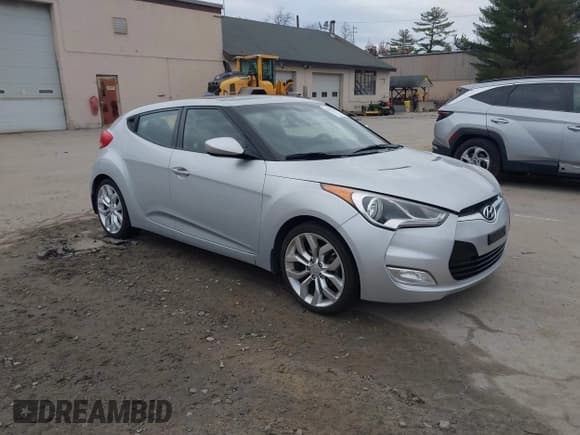 ✅ 2012 Hyundai Veloster w/Gray Int • VIN: KMHTC6AD6CU081281 • Лот: 43797427. Опубликован ранее на IAAI с пробегом 184 987 миль. Бесплатный доступ к архиву аукционных продаж из США и подробный отчёт об истории автомобиля на DreamBid. Изображение 1.