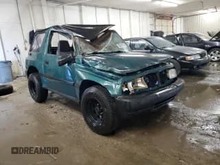 ✅ 1998 Chevrolet Tracker • VIN: 2CNBJ1863W6901170 • Лот: 52914215. Опубликован ранее на Copart с пробегом 163 280 миль. Бесплатный доступ к архиву аукционных продаж из США и подробный отчёт об истории автомобиля на DreamBid. Изображение 4.