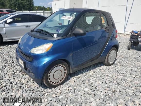 ✅ 2009 Smart fortwo Pure • VIN: WMEEJ31X69K312553 • Лот: 57811135. Опубликован ранее на Copart с пробегом 156 487 миль. Бесплатный доступ к архиву аукционных продаж из США и подробный отчёт об истории автомобиля на DreamBid. Изображение 1.