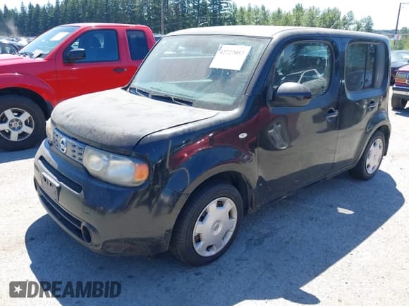 ✅ 2009 Nissan Cube S • VIN: JN8AZ28R89T131699 • Лот: 42727057. Опубликован ранее на IAAI с пробегом 143 923 миль. Бесплатный доступ к архиву аукционных продаж из США и подробный отчёт об истории автомобиля на DreamBid. Изображение 2.