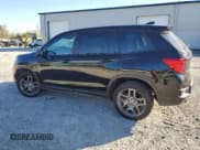 ✅ 2023 Honda Passport EX-L • VIN: 5FNYF8H50PB042311 • Lot: 81919995. Listed on Copart with 31,279 mi. Free auction sales archive from the USA and detailed vehicle history report at DreamBid. Image 2.